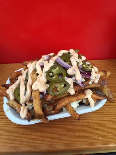 Poutine Supreme with candied jalapenos and red onion topped with chipotle mayo! at Al's Gourmet Falafel and Fries, Salt Spring Island, BC Restaurant
